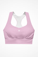 Womens pastel pink longline sports bra with Gymplode icon logo, front view
