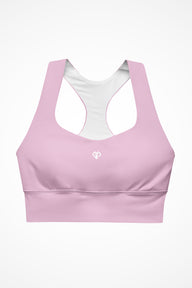 Womens pastel pink longline sports bra with Gymplode icon logo, front view