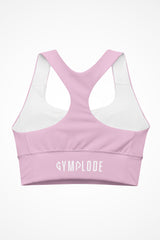 Womens pastel pink longline sports bra with Gymplode signature logo, back view