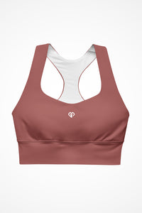 Womens rust clay longline sports bra with Gymplode icon logo, front view