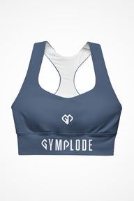 Womens slate blue longline sports bra with Gymplode dual mark logo, front view
