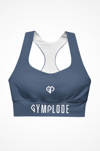 Womens slate blue longline sports bra with Gymplode dual mark logo, front view