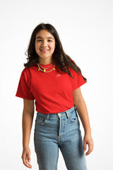 Youth classic fit unisex Gymplode t-shirt with dual mark imprint, front view with model